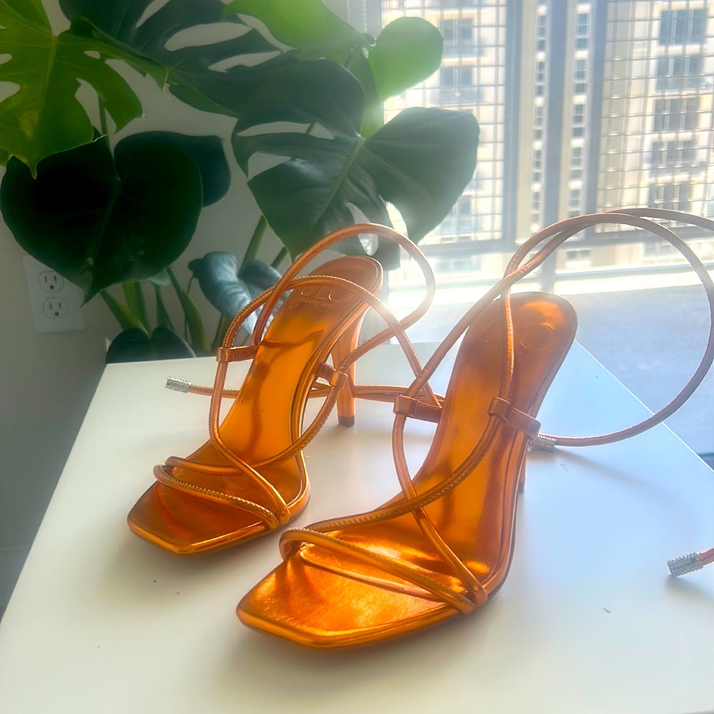 New Chrome orange J Lo size 7 heels . Never Worn.